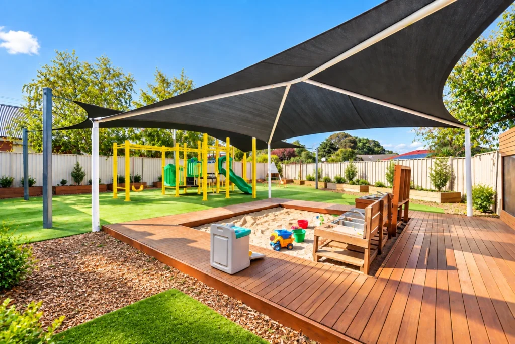 Kidz R Kidz outdoor play area in Cranbourne North with shade sails, climbing equipment and a sandpit